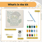 What is in the Fright Night Skull kit: printed canvas, punch needle, threader, threads, color guide and hangers
