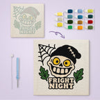 Fright Night Skull canvas before and after punching, with the threads and tools
