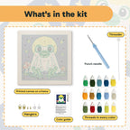 What is in the Frog Ghost at Full Moon kit: printed canvas, punch needle, threader, threads, color guide and hangers