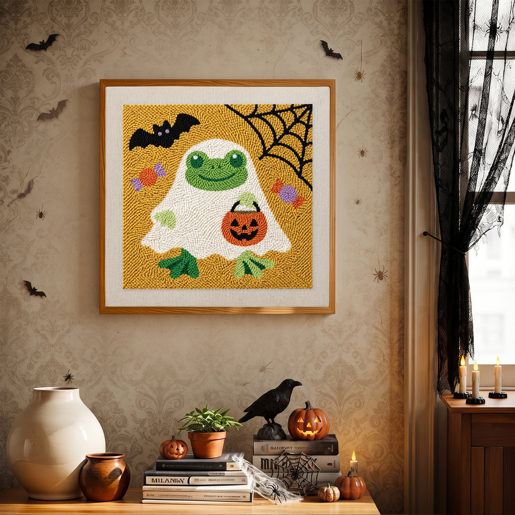 Finished Frog in a Ghost Sheet punch needle canvas on a wall