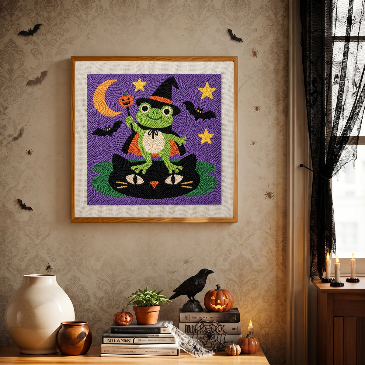 Finished Frog Witch punch needle canvas on a wall