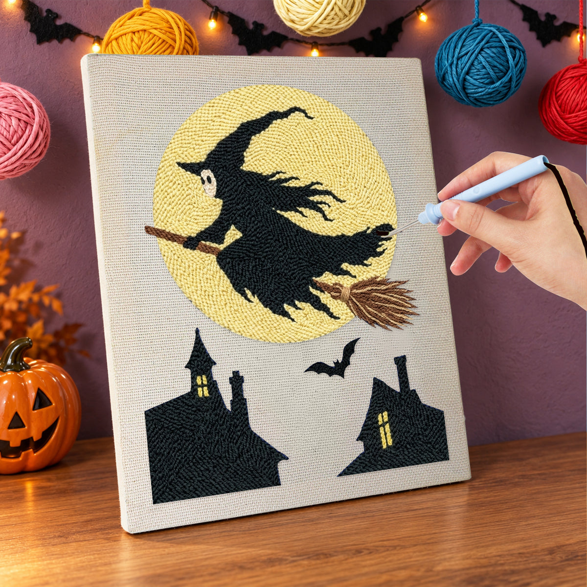 Punching the Full Moon Witch design with the punch needle