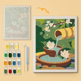 Garden Fountain canvas before and after punching, with the threads and tools