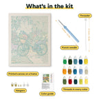 What is in the Garden Path Bicycle kit: printed canvas, punch needle, threader, threads, color guide and hangers
