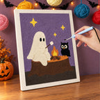 Punching the Ghost and Owl Campfire design with the punch needle