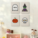 The four Ghost and Witch mini canvases on a wall above a shelf