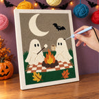 Punching the Ghost Campfire Picnic design with the punch needle