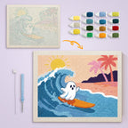 Ghost Catching a Wave canvas before and after punching, with the threads and tools