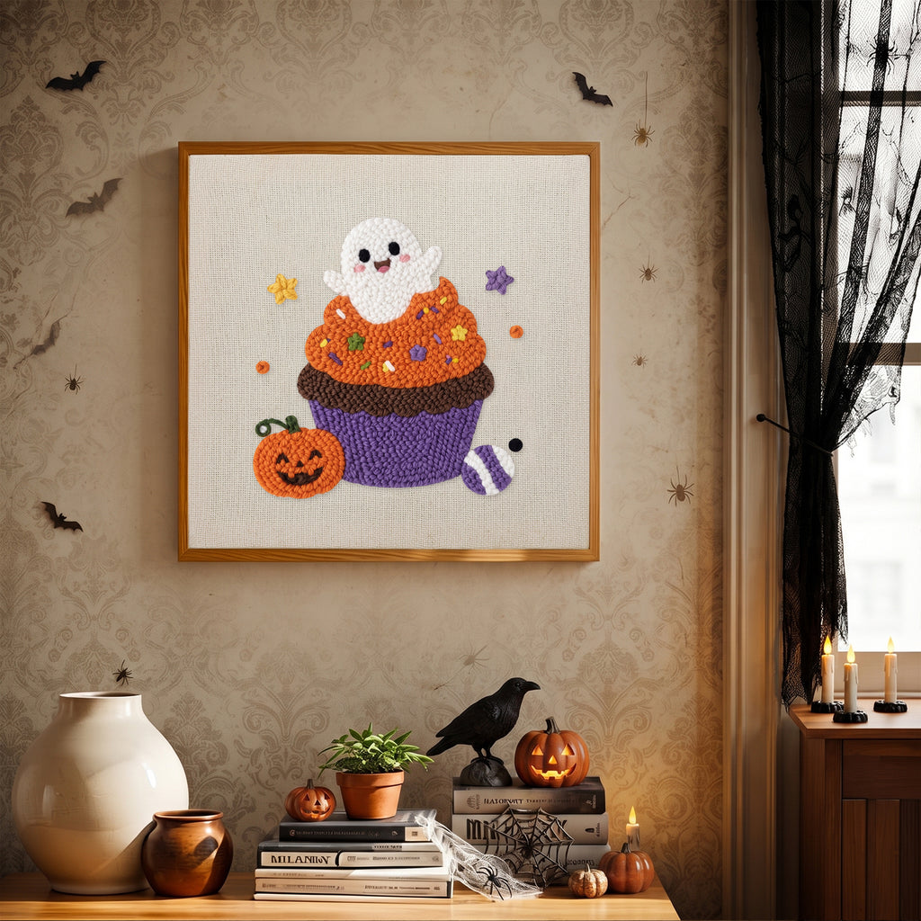 Finished Ghost Cupcake punch needle canvas on a wall