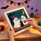 Punching the Ghost Friends and Cat design with the punch needle