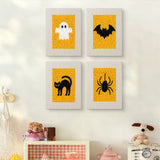 The four Ghost on Yellow mini canvases on a wall above a shelf