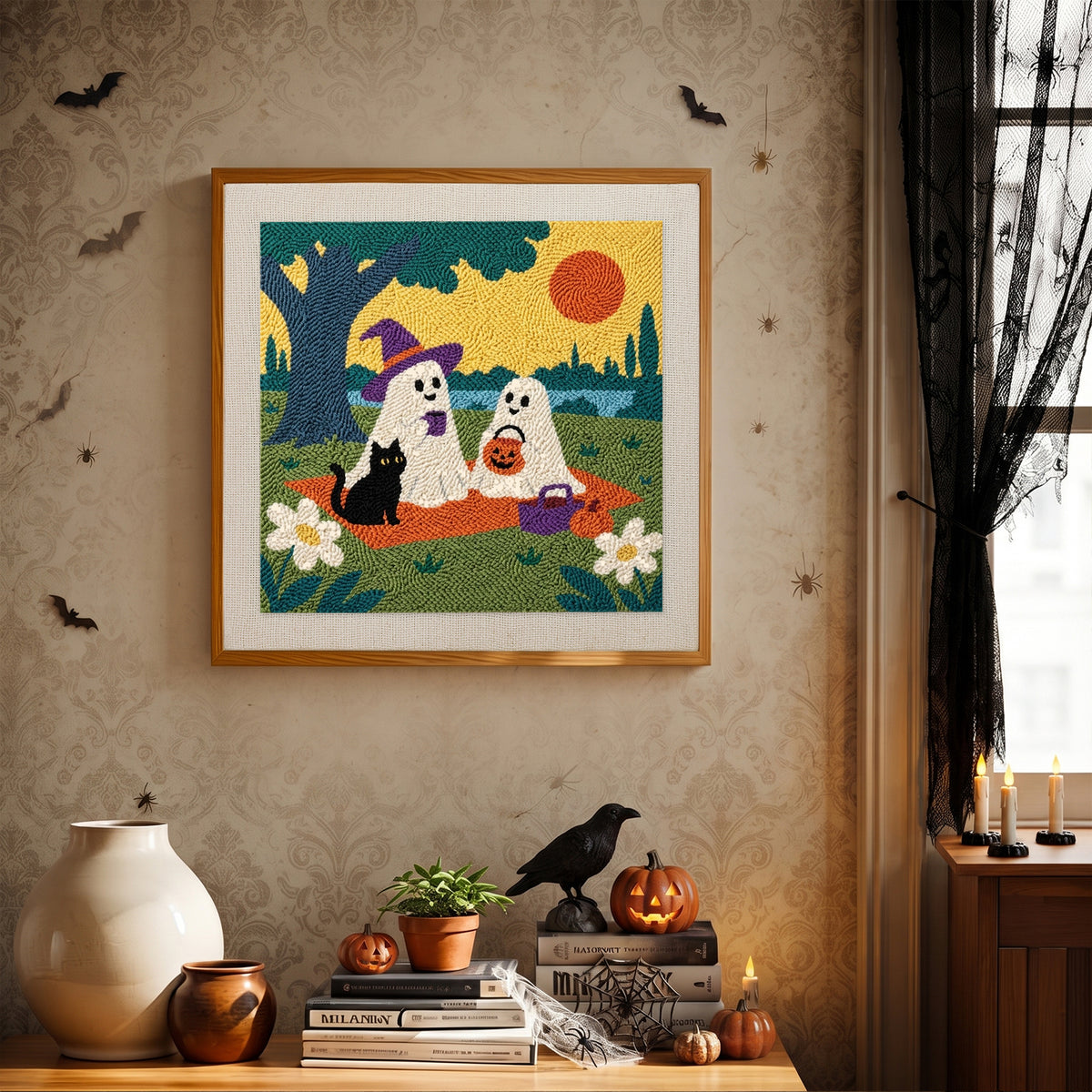 Finished Ghost Picnic punch needle canvas on a wall