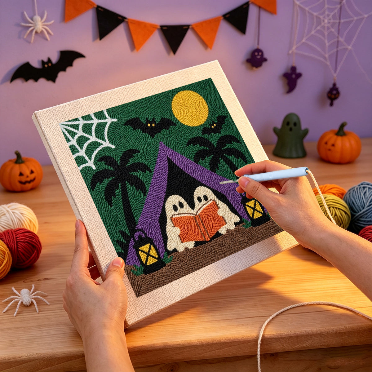 Punching the Ghost Story Tent design with the punch needle