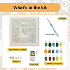 What is in the Ghost Teacher and Skeletons kit: printed canvas, punch needle, threader, threads, color guide and hangers