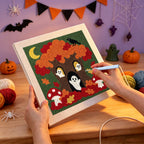 Punching the Ghost Tree House design with the punch needle
