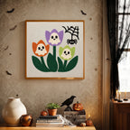Finished Ghost Tulips punch needle canvas on a wall