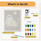 What is in the Ginger Cat Ghost kit: printed canvas, punch needle, threader, threads, color guide and hangers