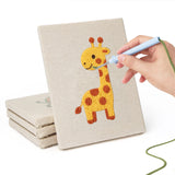 Hand punching one of the Giraffe and Friends mini canvases