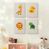 The four Giraffe and Turtle mini canvases on a wall above a shelf