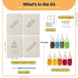 What is in the Glue Bottle Crafts set, 8 × 12 in (20 × 30 cm) each: 4 printed canvases, punch needle, threader, threads, color guide and 4 sets of hangers