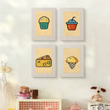 The four Golden Snack Time mini canvases on a wall above a shelf