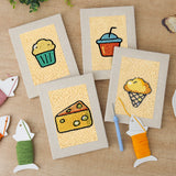 The four finished Golden Snack Time mini canvases laid out on a table