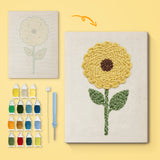 Golden Sunflower canvas before and after punching, with the threads and tools