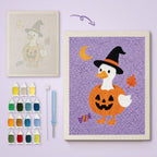 Goose in a Pumpkin canvas before and after punching, with the threads and tools