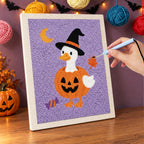 Punching the Goose in a Pumpkin design with the punch needle