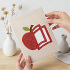 Hand holding a finished Graduation Satchel mini canvas
