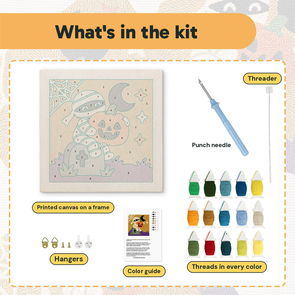 What is in the Graveyard Mummy kit: printed canvas, punch needle, threader, threads, color guide and hangers