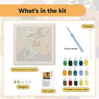 What is in the Graveyard Mummy kit: printed canvas, punch needle, threader, threads, color guide and hangers