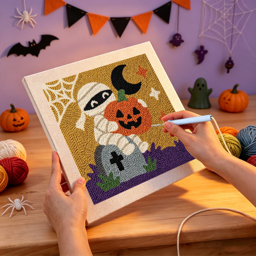 Punching the Graveyard Mummy design with the punch needle