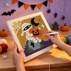 Punching the Graveyard Mummy design with the punch needle