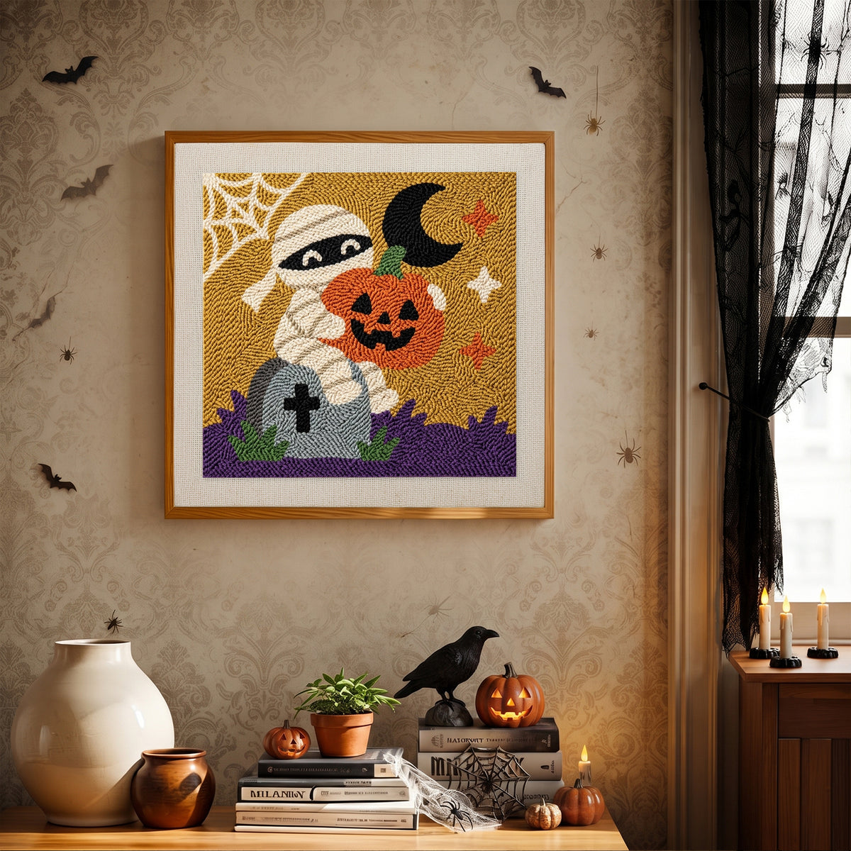 Finished Graveyard Mummy punch needle canvas on a wall