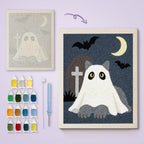 Gray Cat Graveyard Ghost canvas before and after punching, with the threads and tools