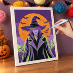 Punching the Green-Eyed Witch design with the punch needle