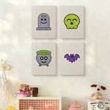 The four Green Skull Cauldron mini canvases on a wall above a shelf