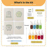 What is in the Green Skull Cauldron set: 4 printed canvases, punch needle, threader, threads, color guide and 4 sets of hangers (6 × 8 in (15 × 20 cm) each)
