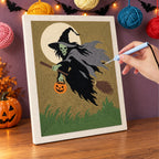Punching the Green Witch in Flight design with the punch needle