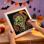 Punching the Grinning Zombie design with the punch needle