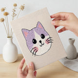 Hand holding a finished Grumpy Cat Faces mini canvas