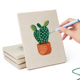 Hand punching one of the Hanging Plant Corner mini canvases
