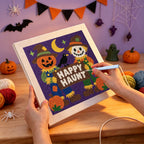 Punching the Happy Haunt Scarecrows design with the punch needle