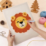 Punching the Happy Lion design with the punch needle
