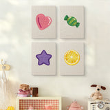 The four Heart Candy Mix mini canvases on a wall above a shelf