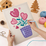 Punching the Heart Flower Pot design with the punch needle