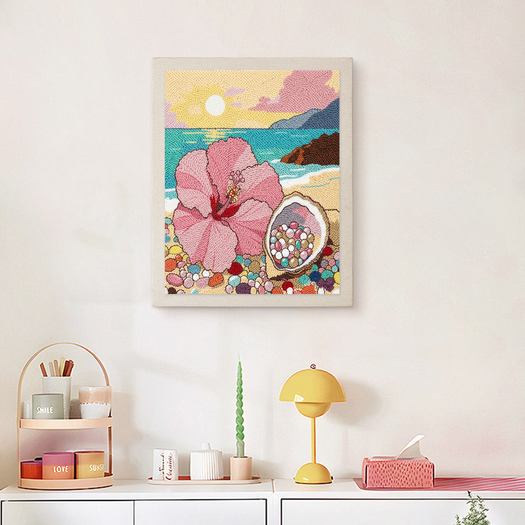 Finished Hibiscus Beach punch needle canvas on a wall
