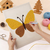 Punching the Honey Brown Butterfly design with the punch needle