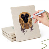 Hand punching one of the Hound and Kittens mini canvases